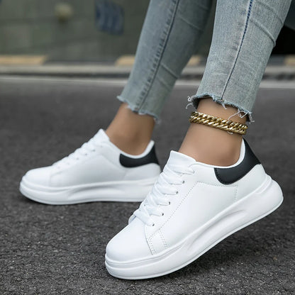 White leather sneakers – women