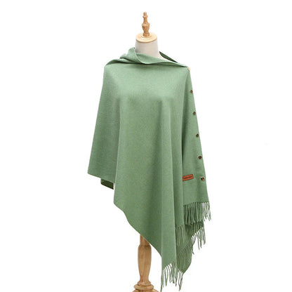 Elegant women's knitted poncho coat with buttons