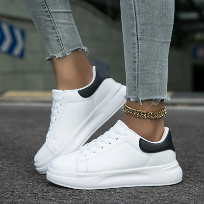 White leather sneakers – women