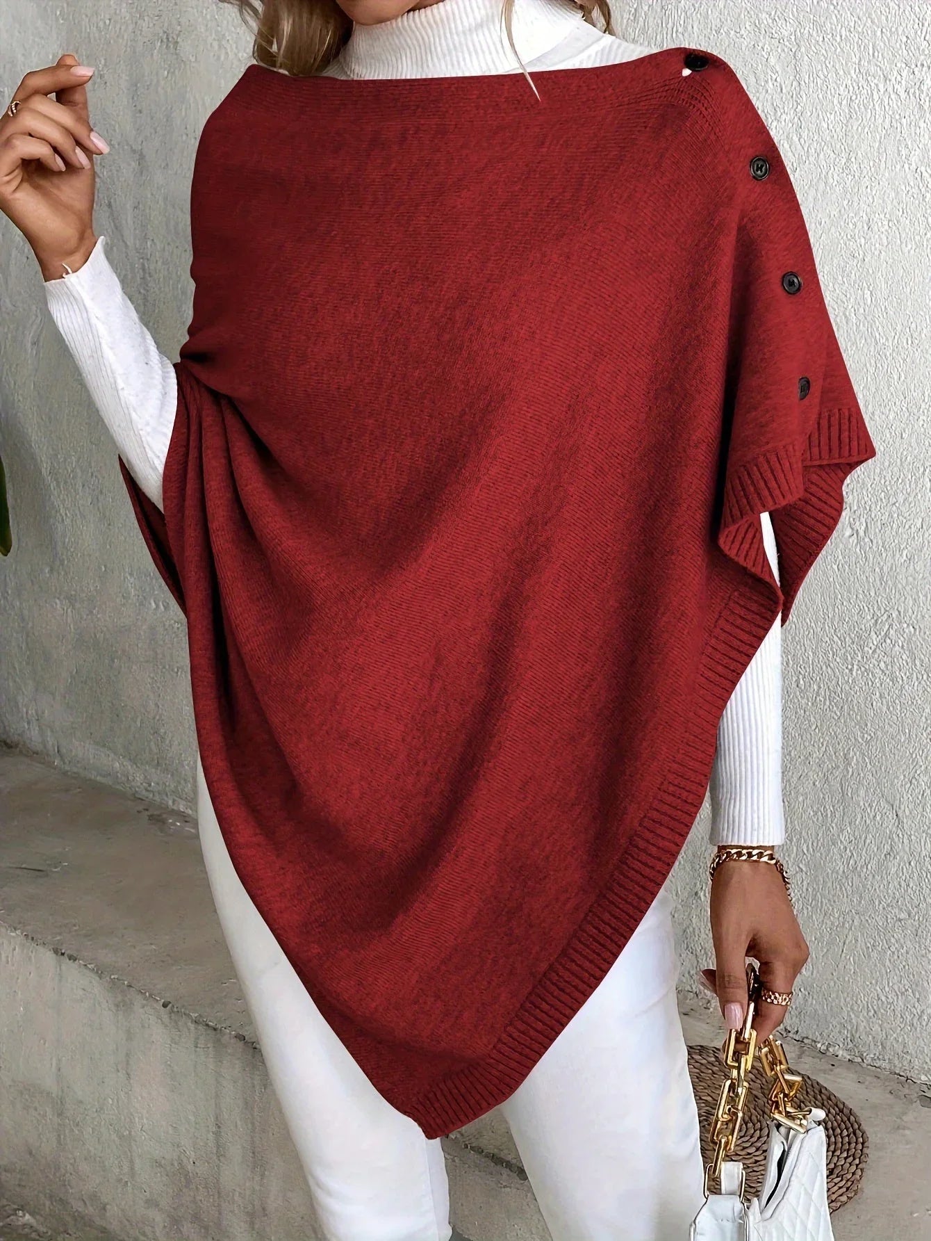Elegant women's knitted poncho coat with buttons