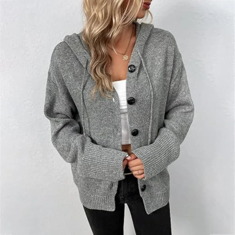 Warm women's knitted cardigan with buttons