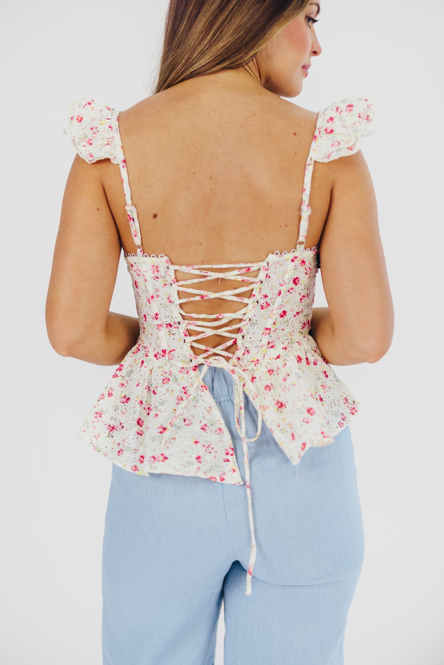 Baylin Peplum Top in White/Red Floral