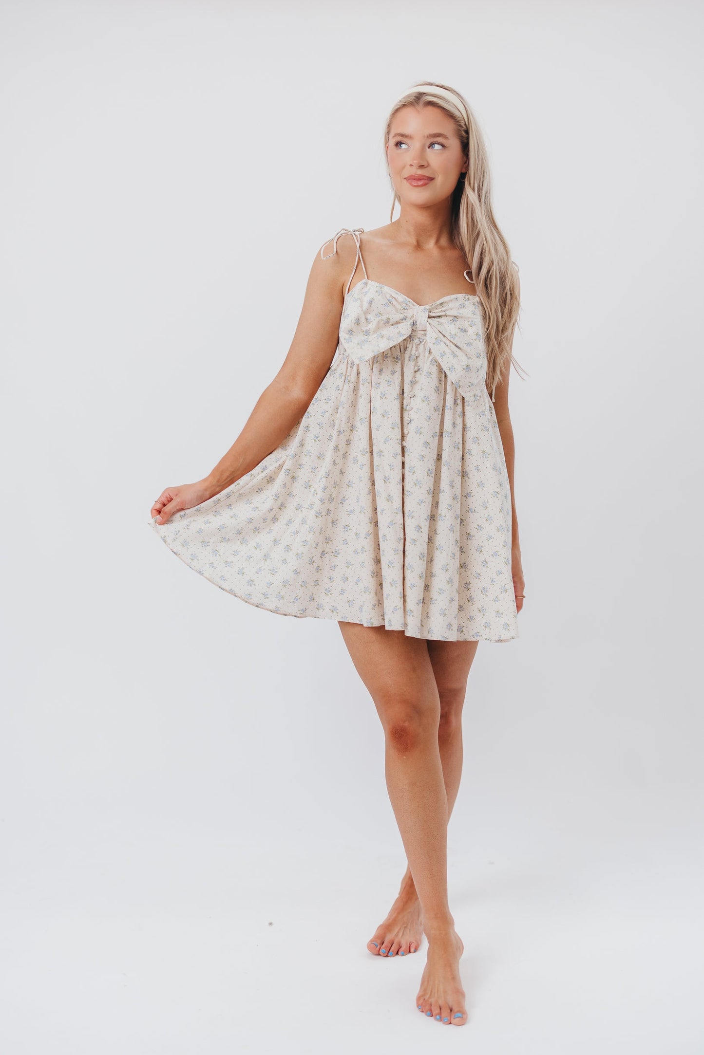 Irelyn Babydoll Mini Dress with Bow Accent in Cream/Blue Floral & Polka Dot