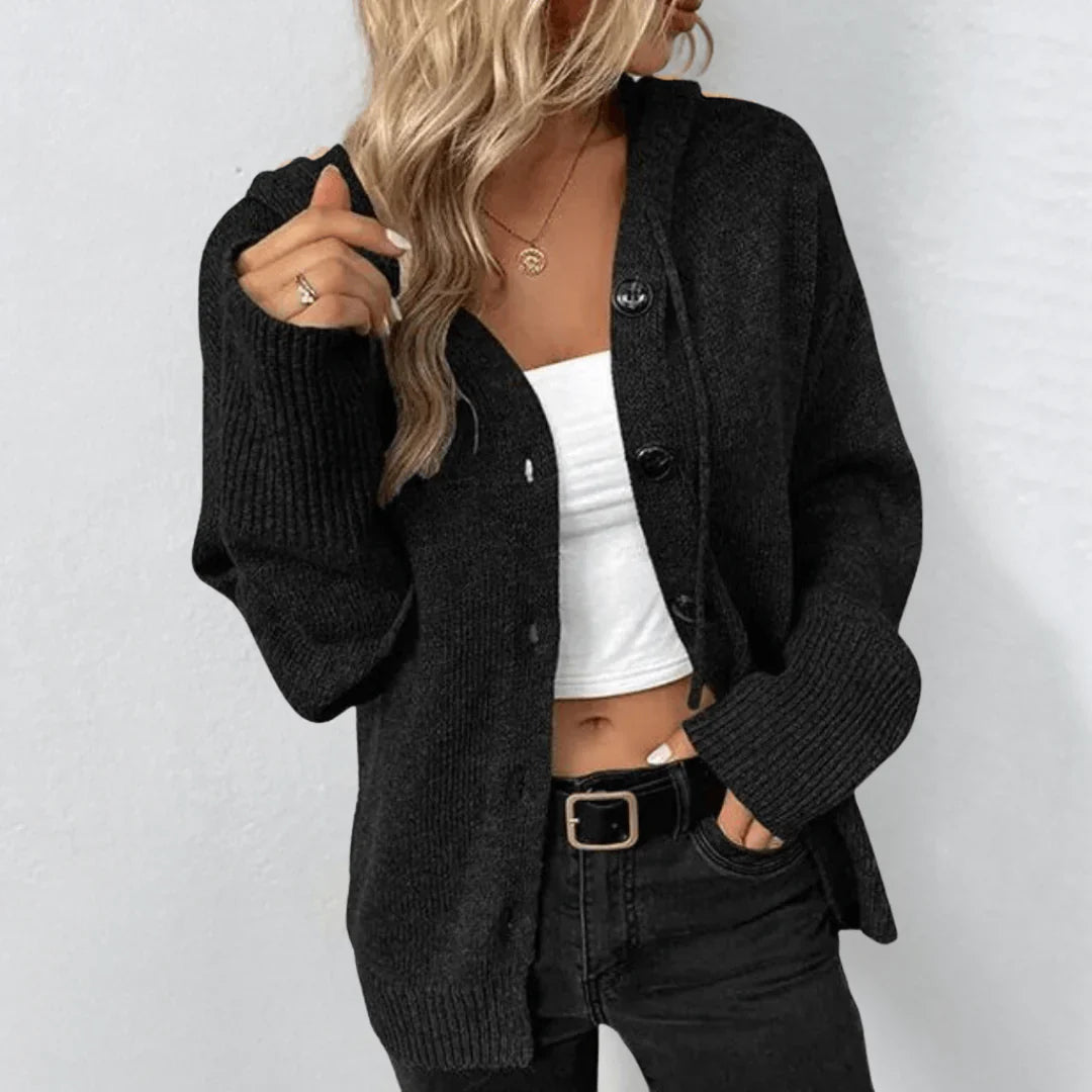 Warm women's knitted cardigan with buttons
