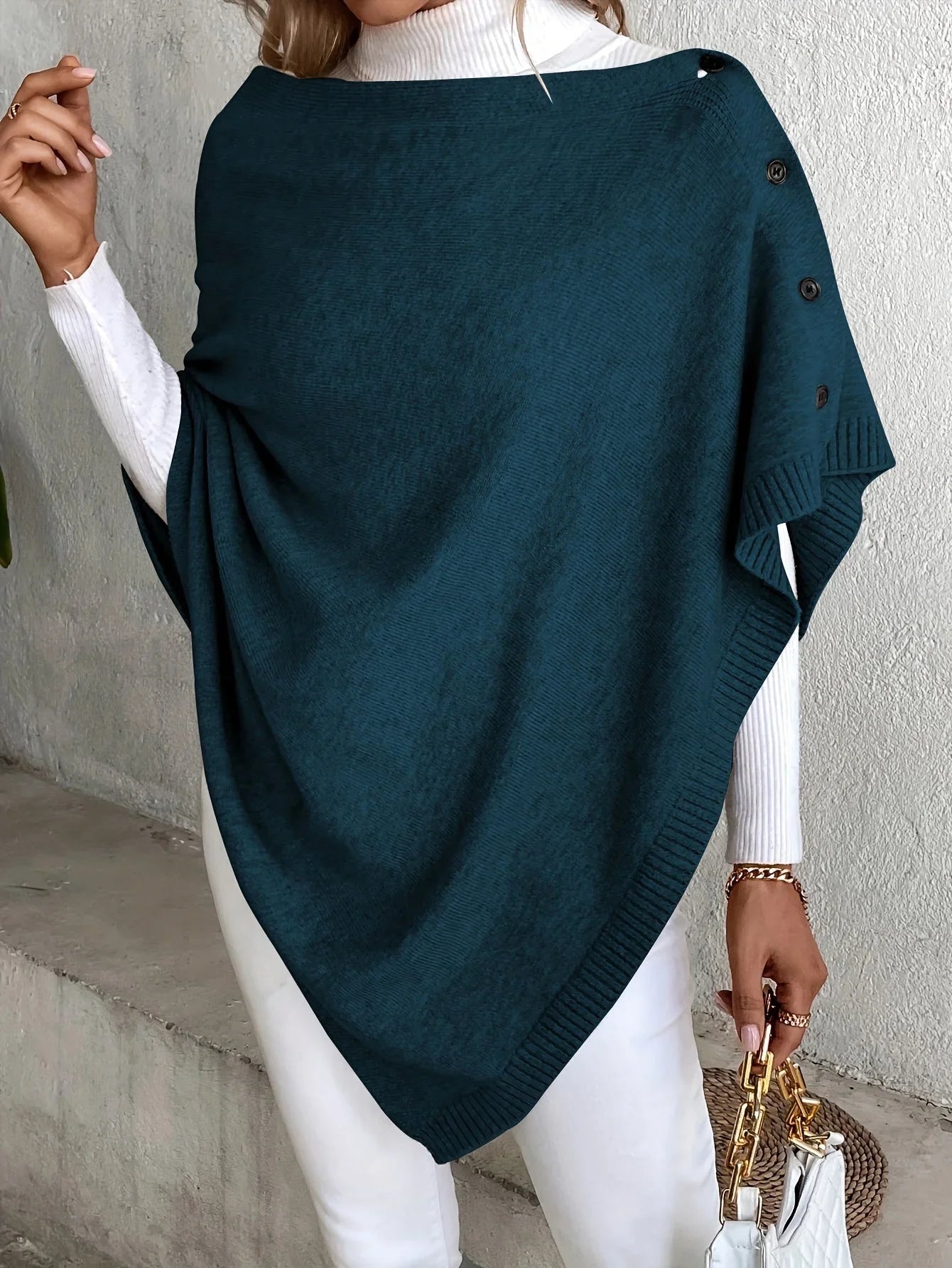 Elegant women's knitted poncho coat with buttons