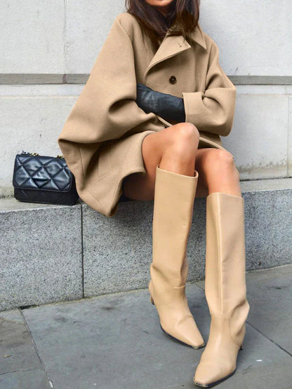 Oversized women's coat with buttons – modern winter look