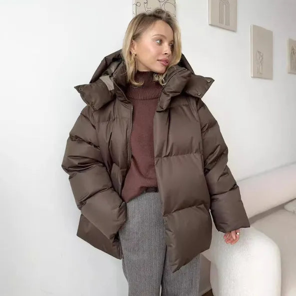 Warm women's winter jacket with hood