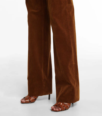 Women's leather mules with heel and bow accent