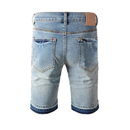 The Calder Distressed Denim Shorts