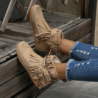 Suede ankle boots with fringe and studs
