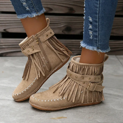 Suede ankle boots with fringe and studs