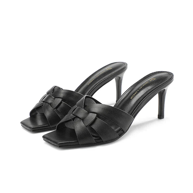 Women's leather mules with heel and bow accent