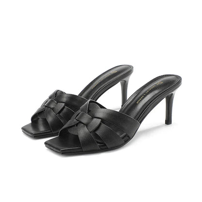 Women's leather mules with heel and bow accent