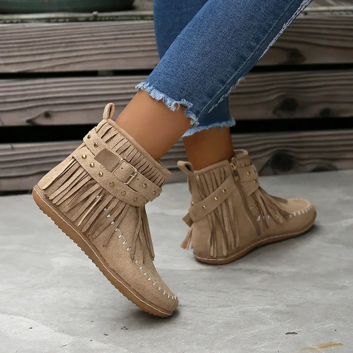 Suede ankle boots with fringe and studs