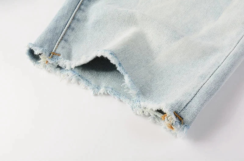 The Barlow Distressed Denim Shorts