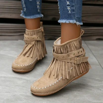 Suede ankle boots with fringe and studs