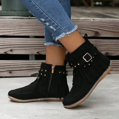 Suede ankle boots with fringe and studs
