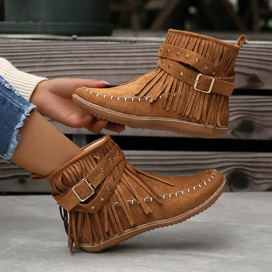 Suede ankle boots with fringe and studs