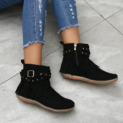 Suede ankle boots with fringe and studs