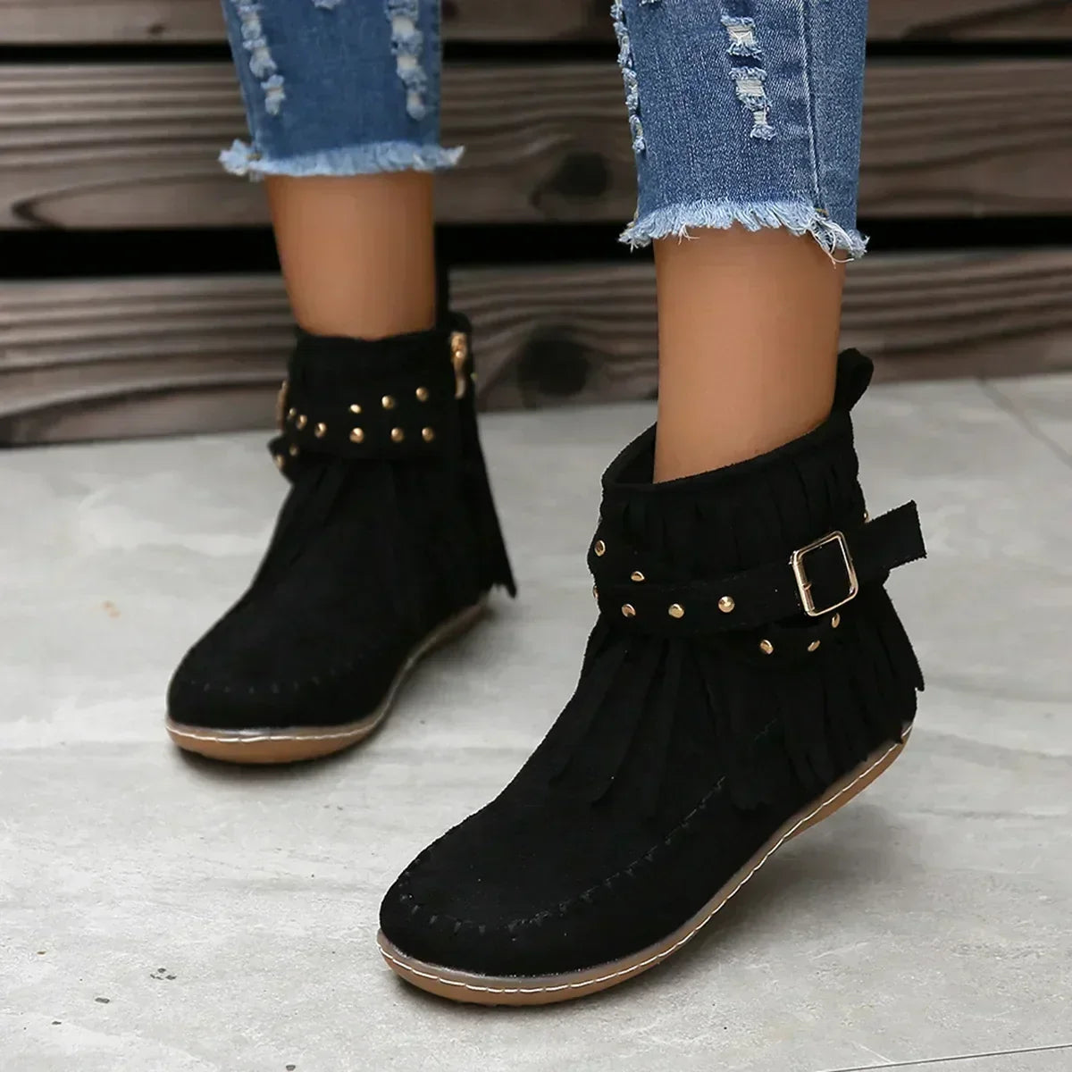 Suede ankle boots with fringe and studs