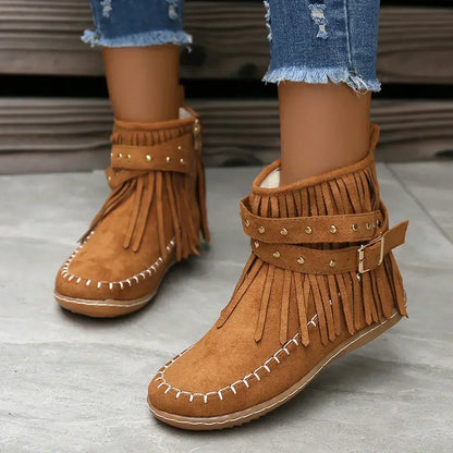 Suede ankle boots with fringe and studs