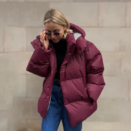 Warm women's winter jacket with hood