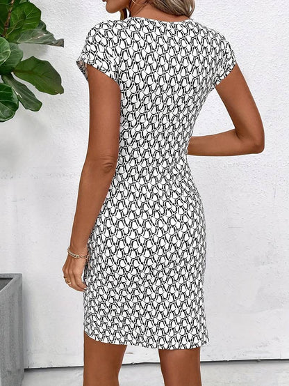 Emma – short-sleeved tulip dress with all-over print