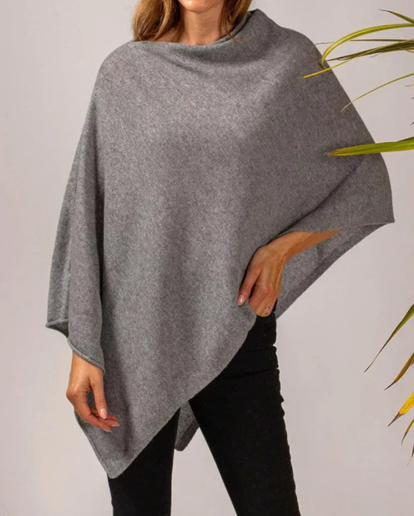 Elegant women's knitted poncho coat with buttons