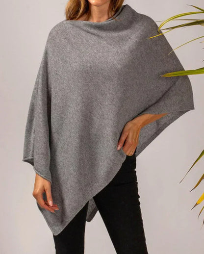 Elegant women's knitted poncho coat with buttons