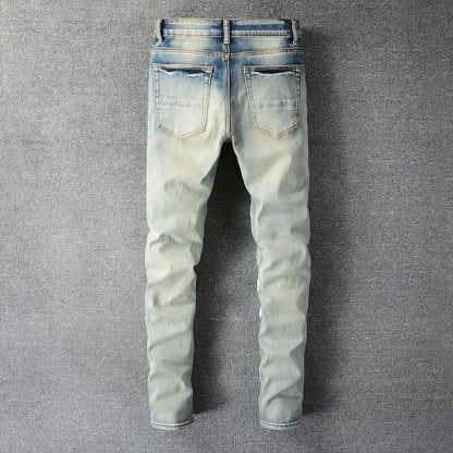 The Outsider Distressed Patchwork Denim Jeans