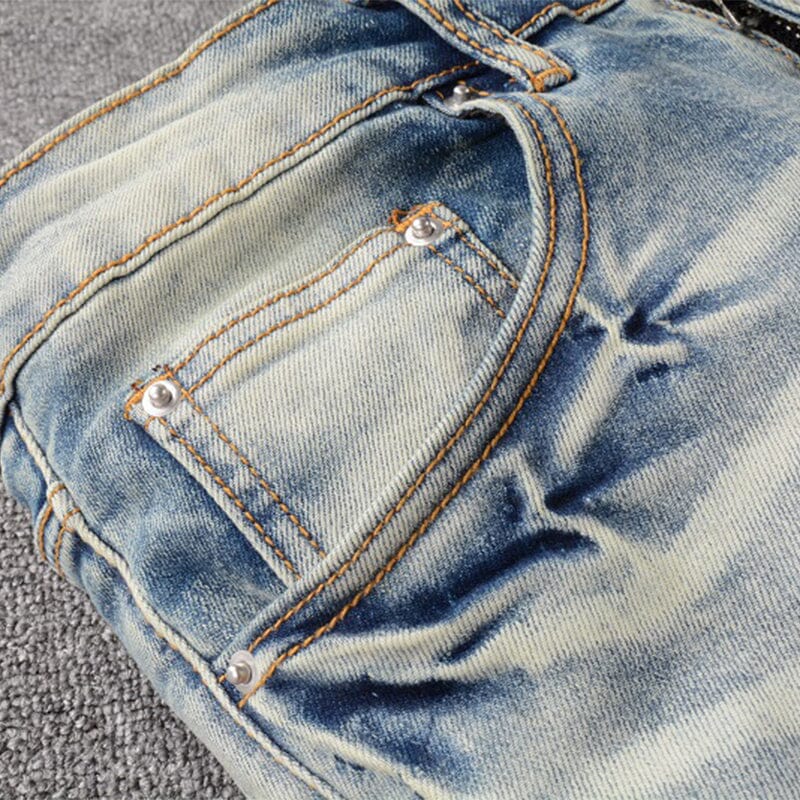 The Outsider Distressed Patchwork Denim Jeans